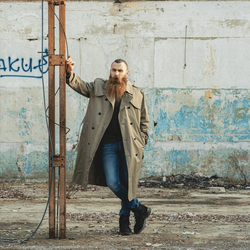 Dutch army Coat Khaki long officer trench coat with lining coat  a man with long beard and long coat leaning on a metal pole